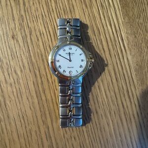Raymond Weil Silver and Gold Roman Numeral Watch